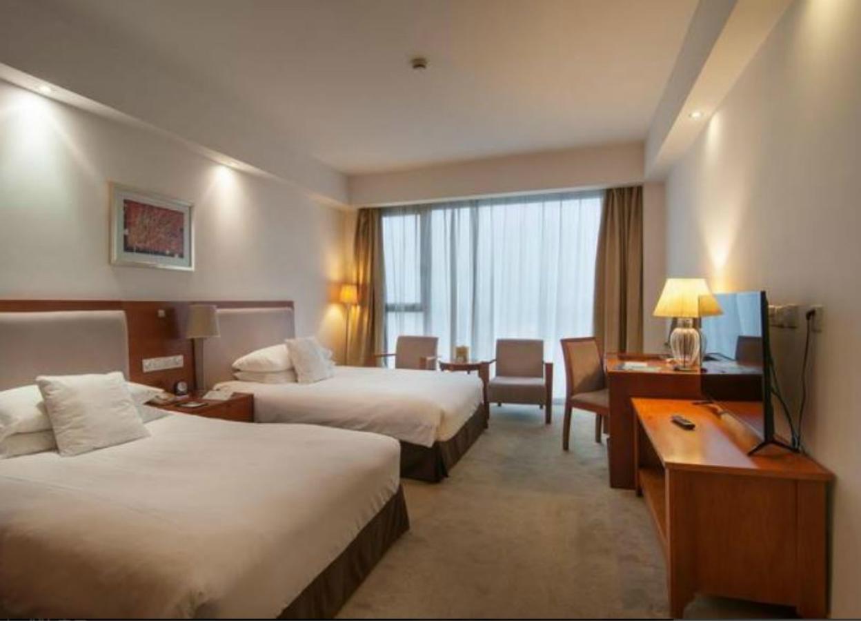 Gloria Plaza Hotel Kangqiao Sanghaj Kültér fotó